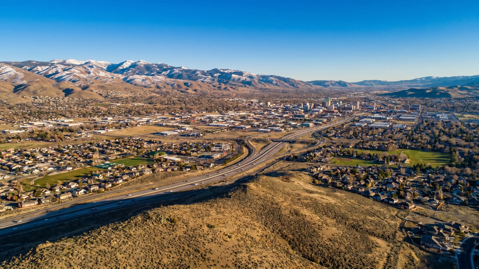 Reno-Sparks Truckee Meadows valley aerial — best Reno neighborhoods for newcomers 2026